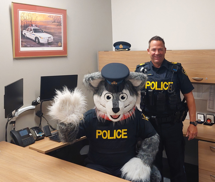 2 Acting Staff Sergeant Alain Potvin and new mascot Hawkesbury OPP